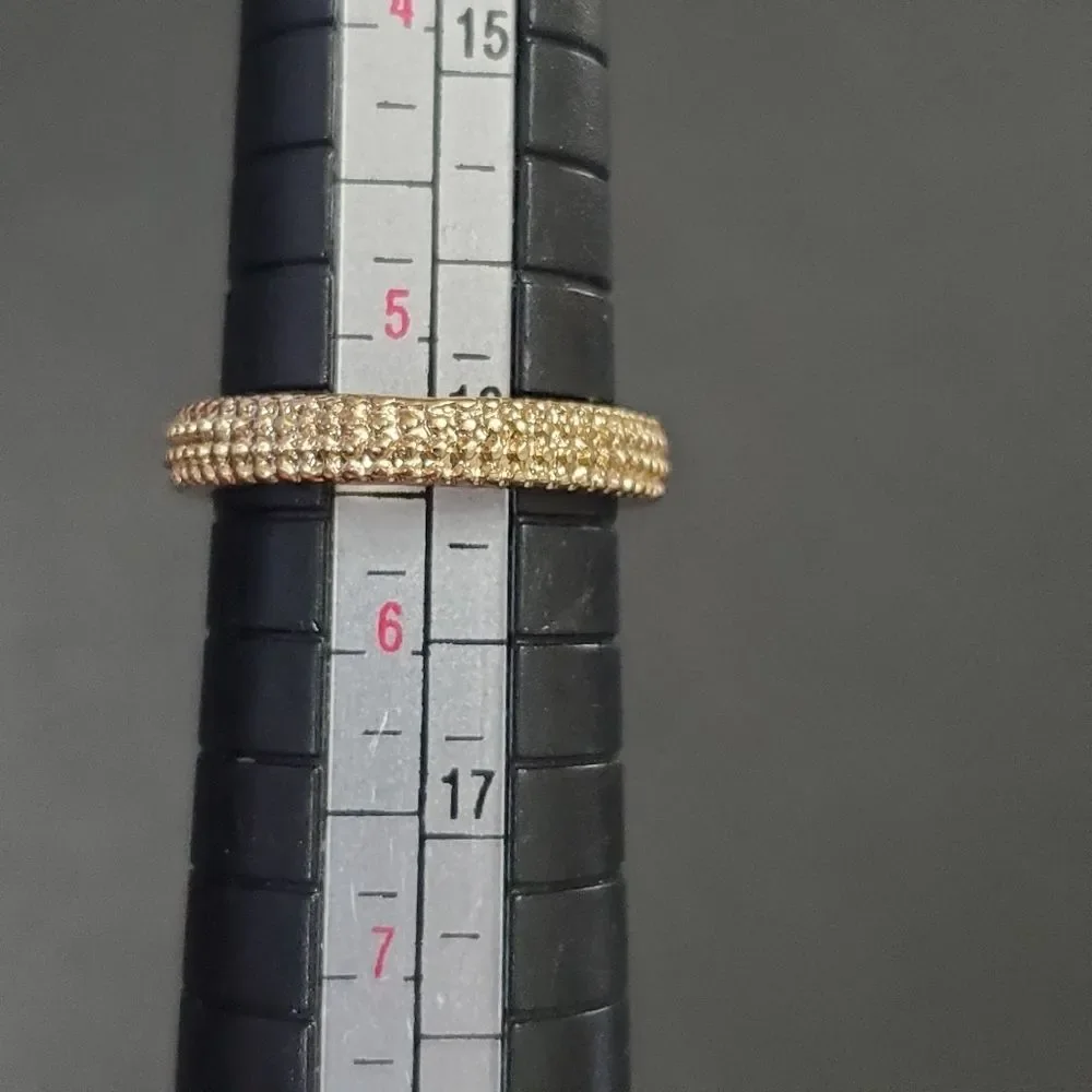 Gold tone textured ring - approx 5.25